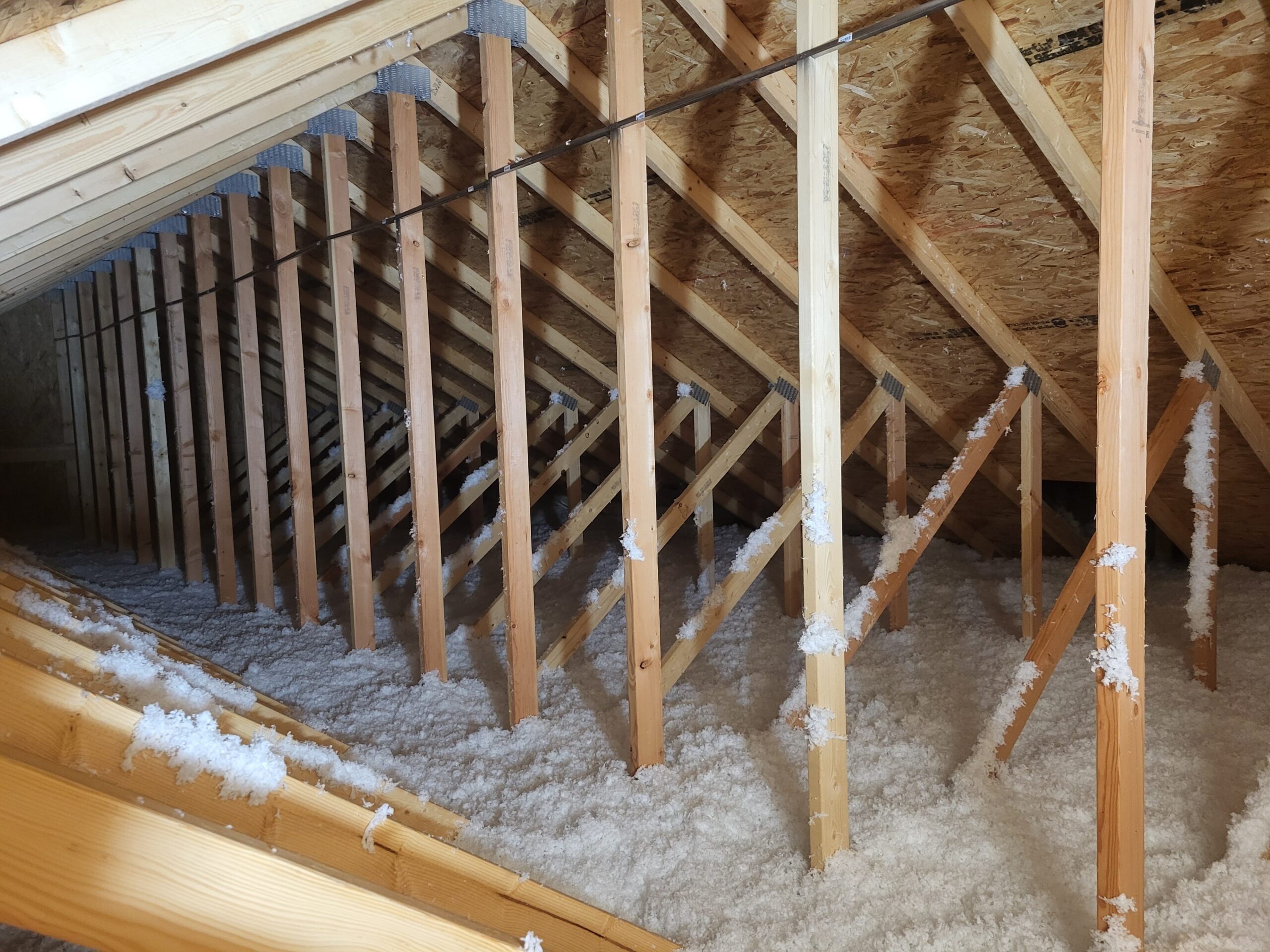 Blown-in insulation installed in Iowa home attic floor