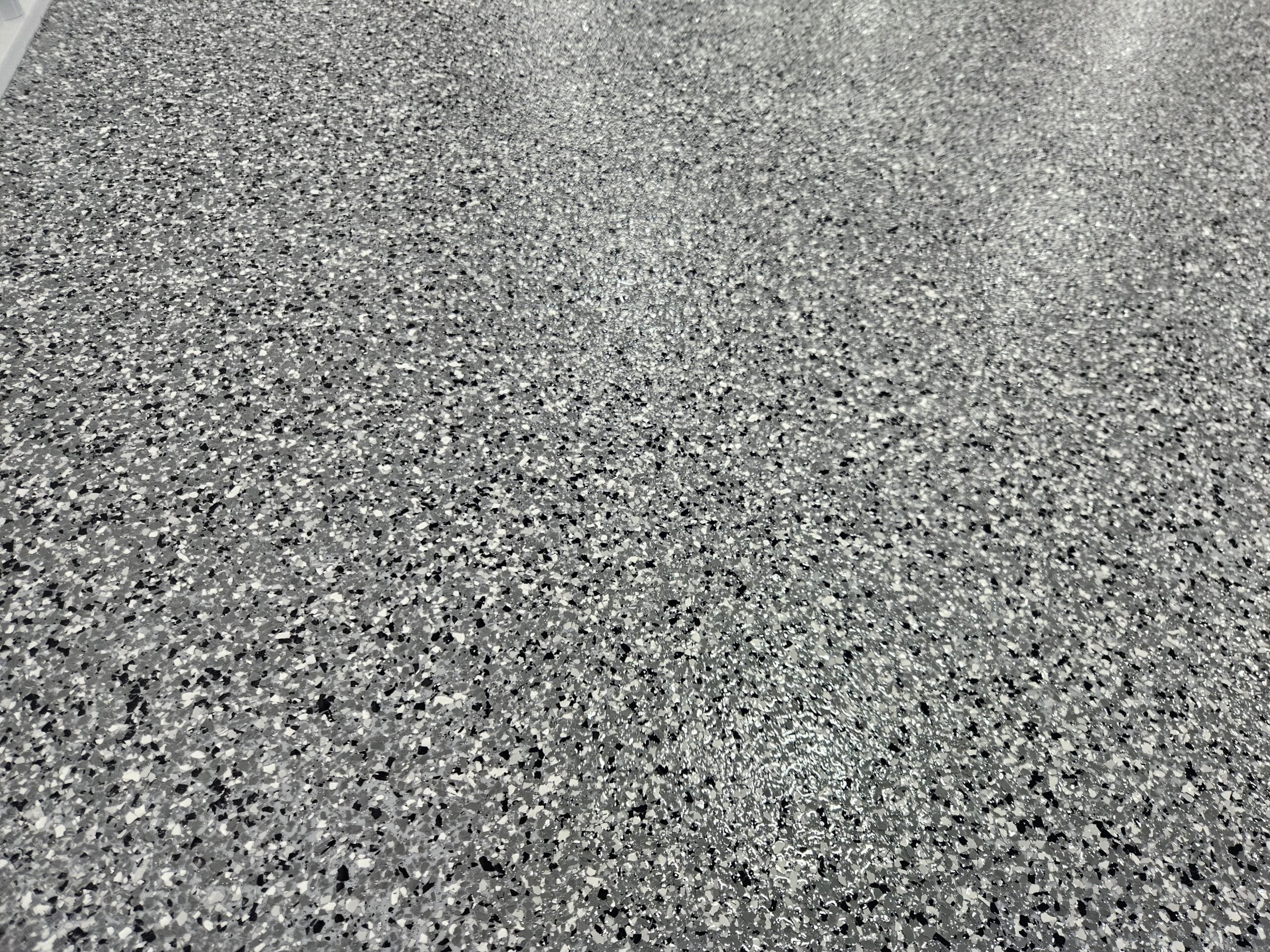 Grey metallic chip epoxy floor closeup in Fargo ND