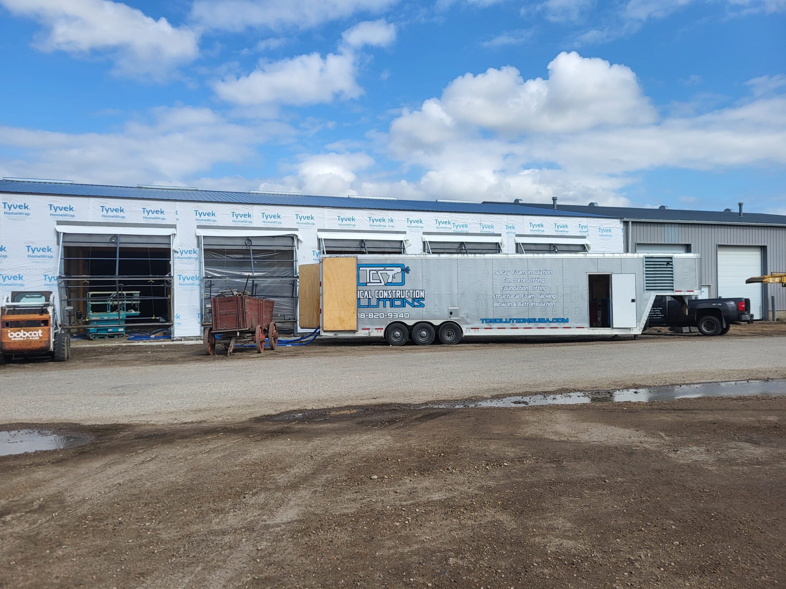 Air barrier wrap installation on commercial building exterior – Upper Midwest waterproofing contractor TCS