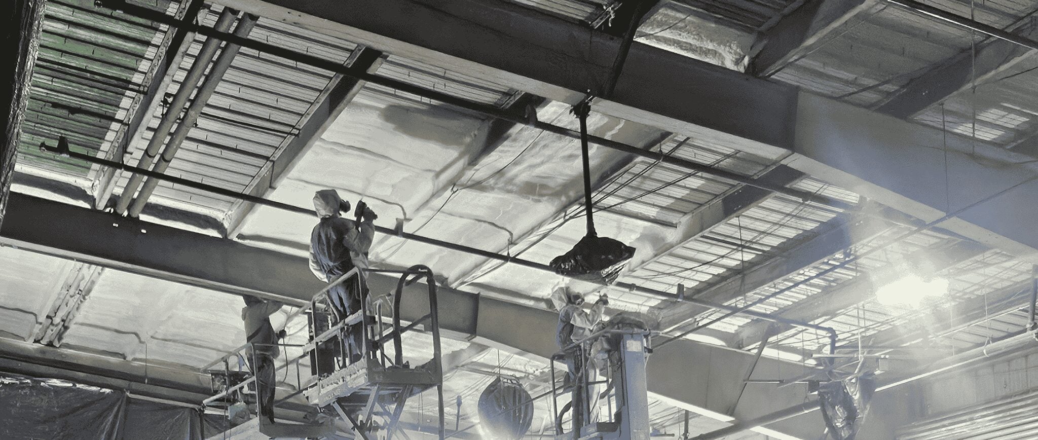 Technical Construction Solutions advanced track rig for high-capacity commercial spray foam application