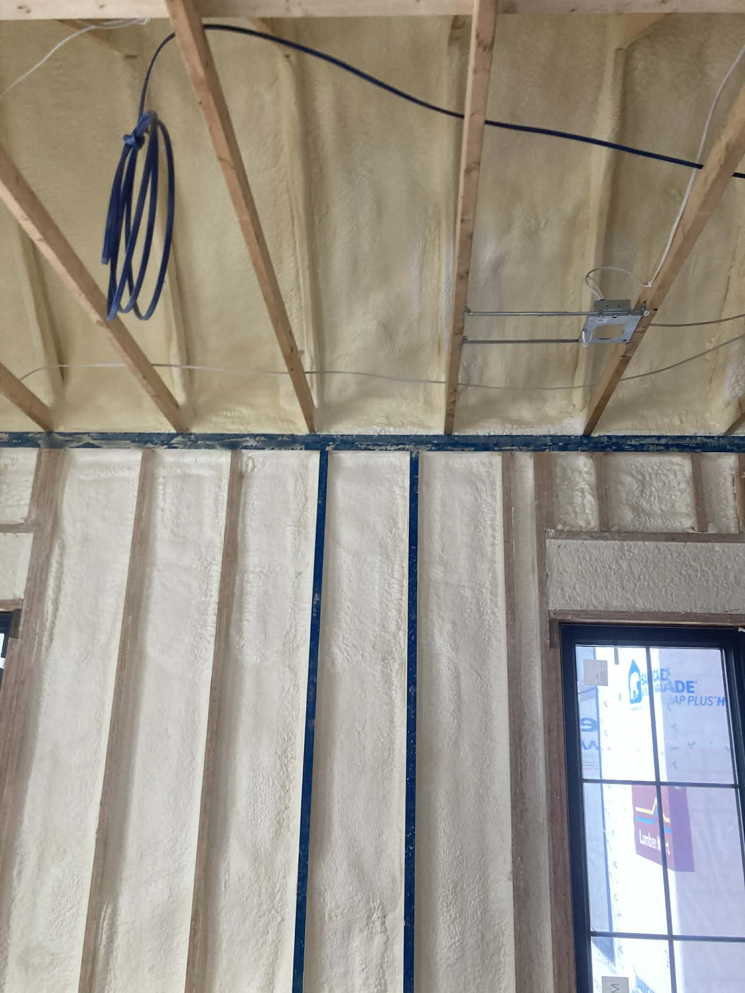 Closed-cell and open-cell spray foam insulation in Iowa agricultural and residential building