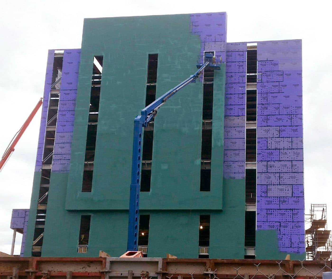 Air barrier wrap installation on commercial building exterior – Upper Midwest waterproofing contractor TCS