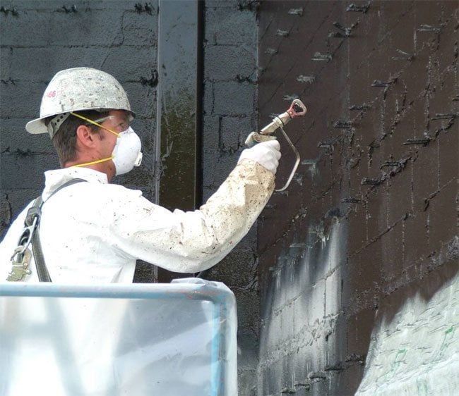 Spray applied air barrier coating on CMU commercial wall in Brainerd, MN
